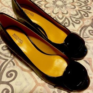 Never worn. Brand new, black patent leather shoes.